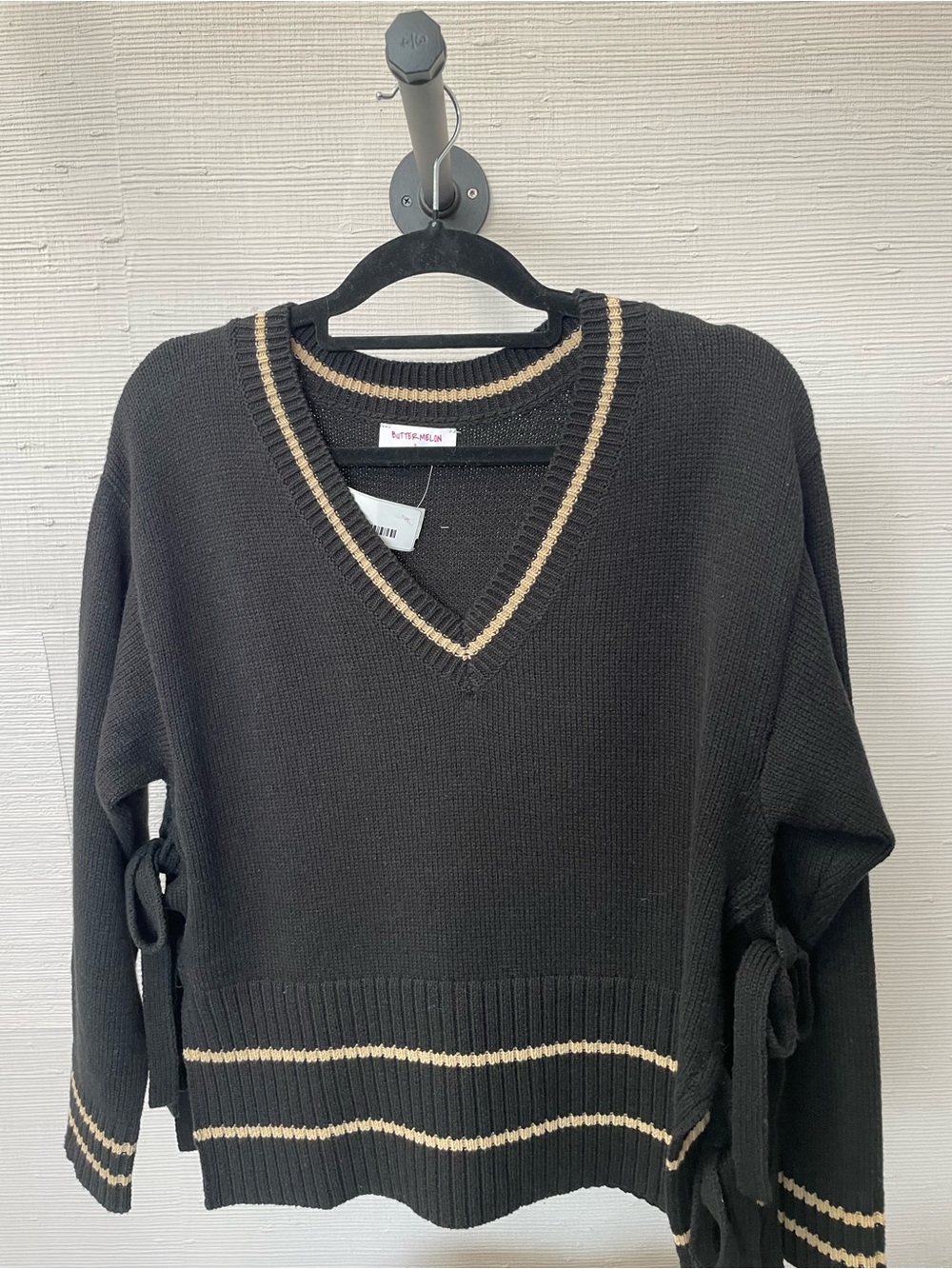 V-Neck Black Sweater with Cream Stripe Trim